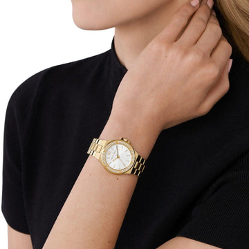 Γυναικείο ρολόι Michael Kors Lennox MK7278 με χρυσό ατσάλινο μπρασελέ, άσπρο καντράν και στρογγυλό στεφάνι 32mm με ζιργκόν.